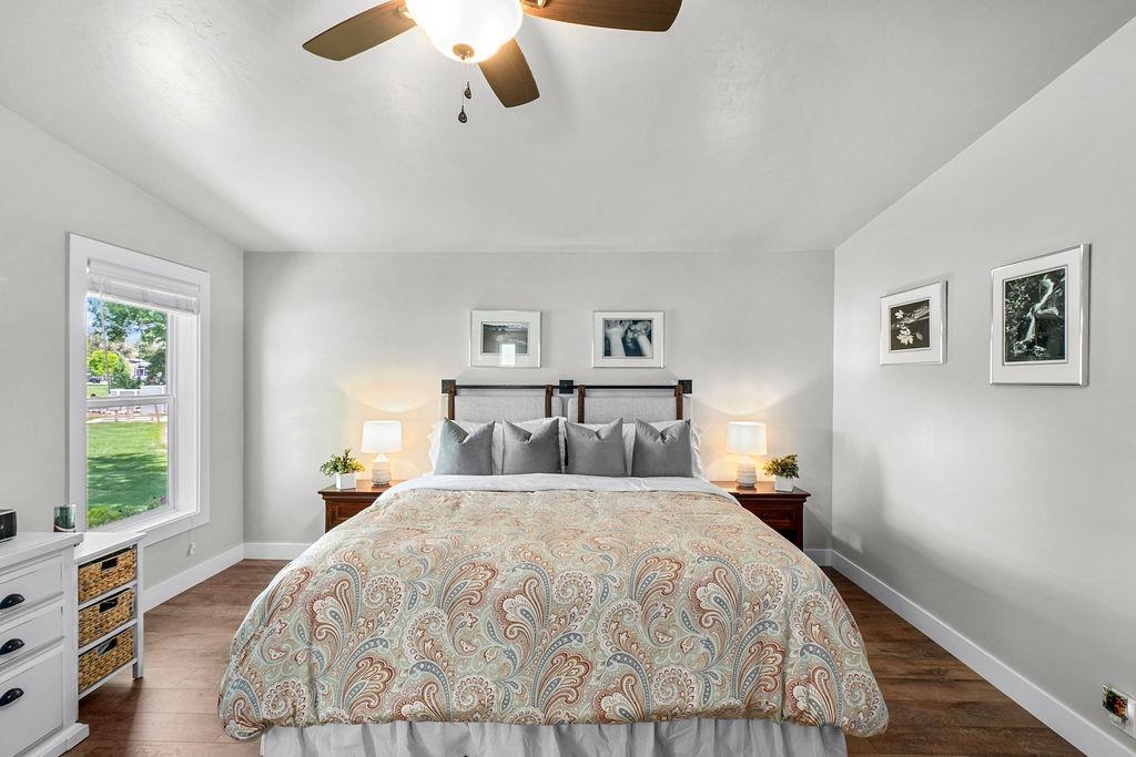 435 32 Road, Unit 601 Clifton, CO 81520 - Photo 11 of 26 a bedroom with a large bed and a window