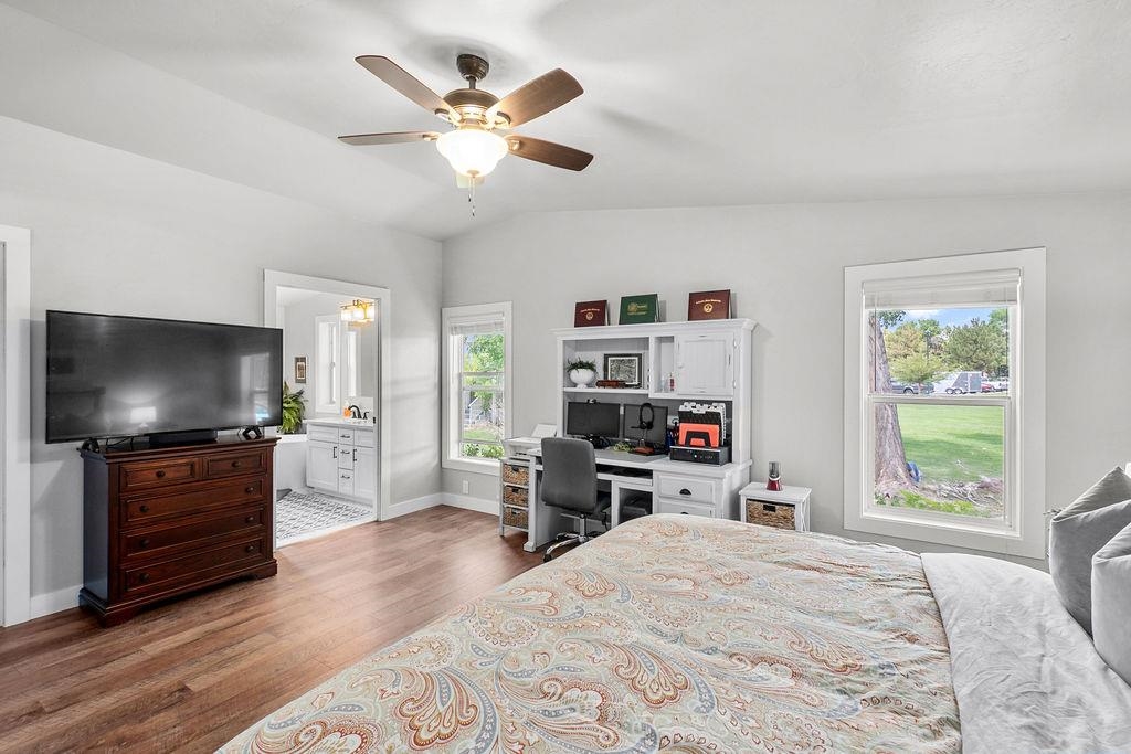 435 32 Road, Unit 601 Clifton, CO 81520 - Photo 12 of 26 a bedroom with furniture and a flat screen tv