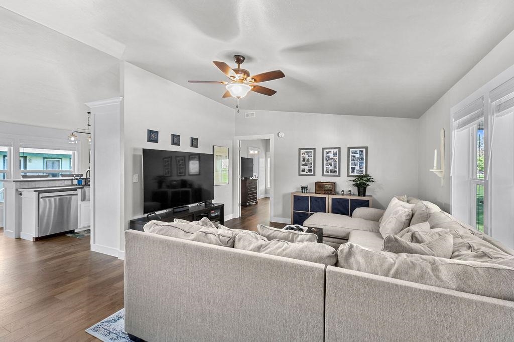 435 32 Road, Unit 601 Clifton, CO 81520 - Photo 2 of 26 a living room with furniture and a flat screen tv