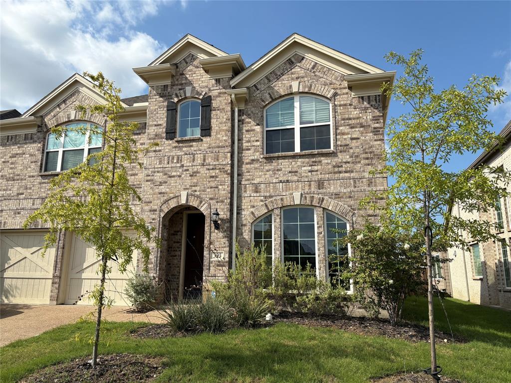 323 Butternut Way Irving, TX 75063 - Photo 2 of 32 front view of a house with a yard