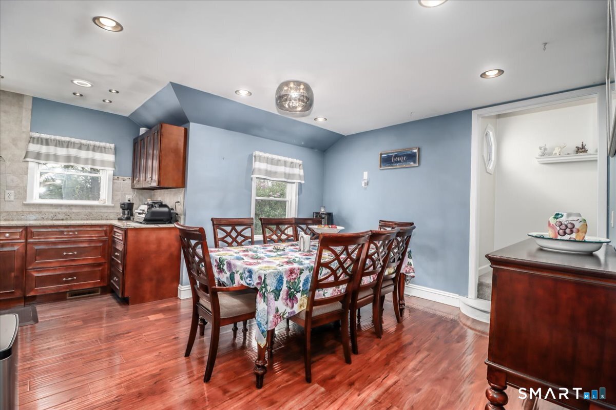 4 Farrell Road Newtown, CT 06470 - Photo 10 of 36 a view of a dining room with furniture