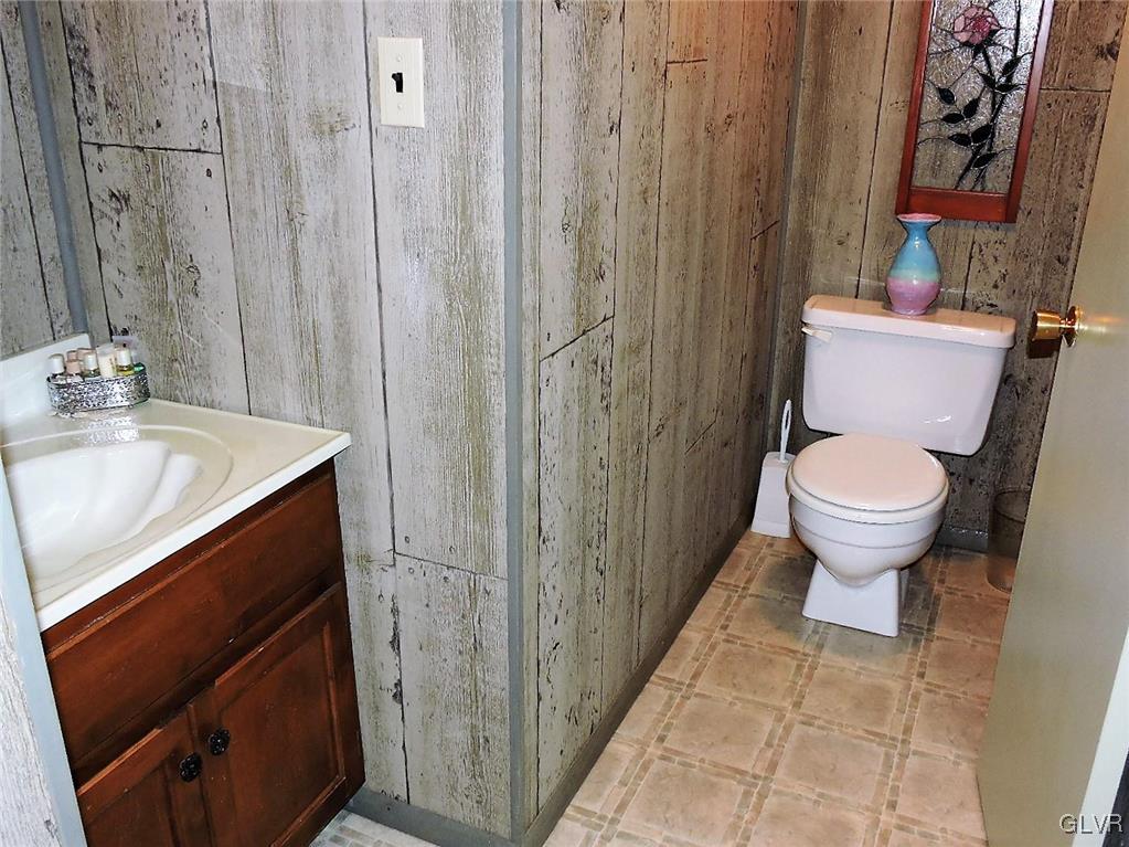 621 Long Mountain Road Effort, PA 18330 - Photo 21 of 22 a bathroom with a sink a toilet and shower
