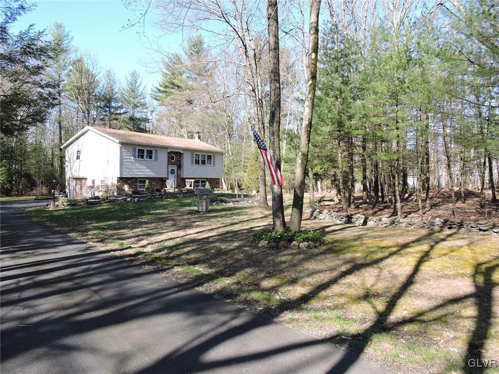 621 Long Mountain Road Effort, PA 18330 - Photo 3 of 22 a view of a house with a yard