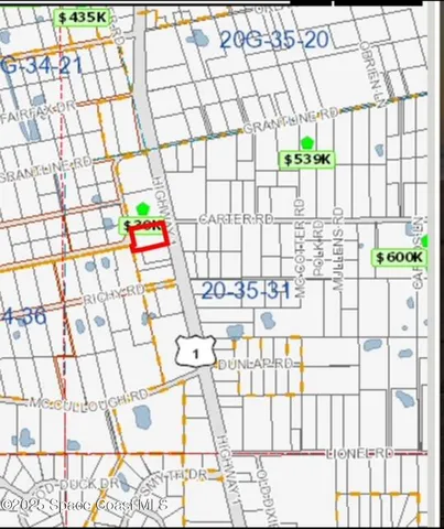 a bathroom with a sink and a shower curtain