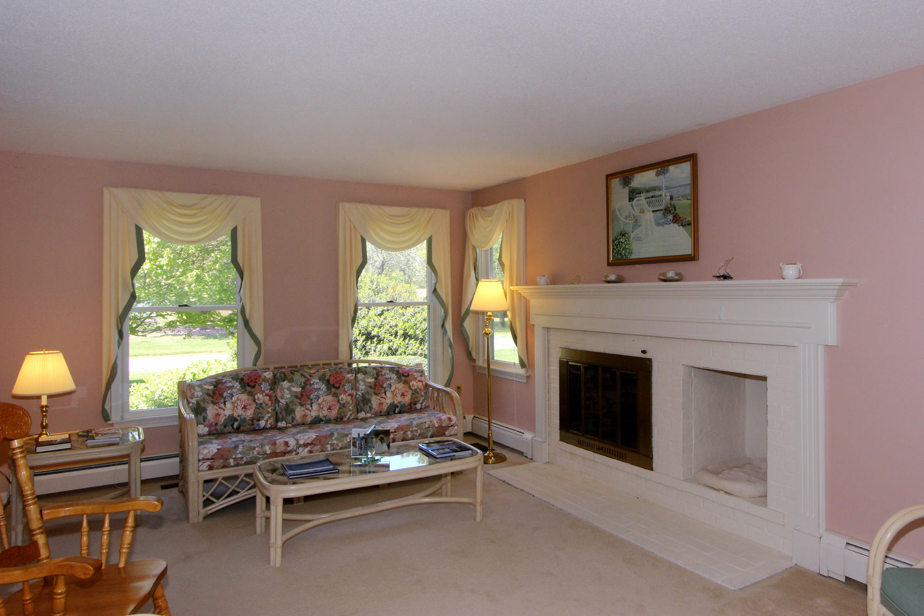 167 Ambergris Circle Brewster, MA 02631 - Photo 13 of 28 a living room with furniture and a fireplace
