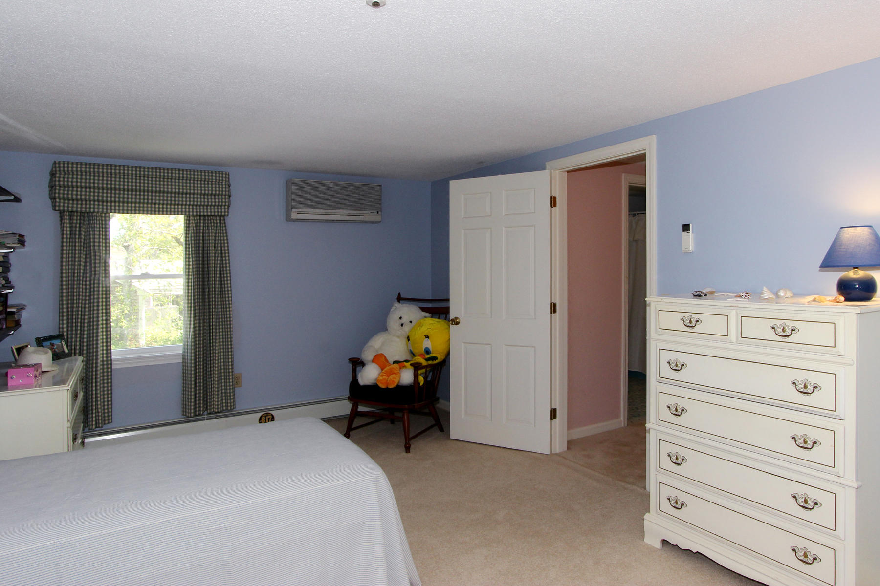 167 Ambergris Circle Brewster, MA 02631 - Photo 21 of 28 a bedroom with a bed and a closet