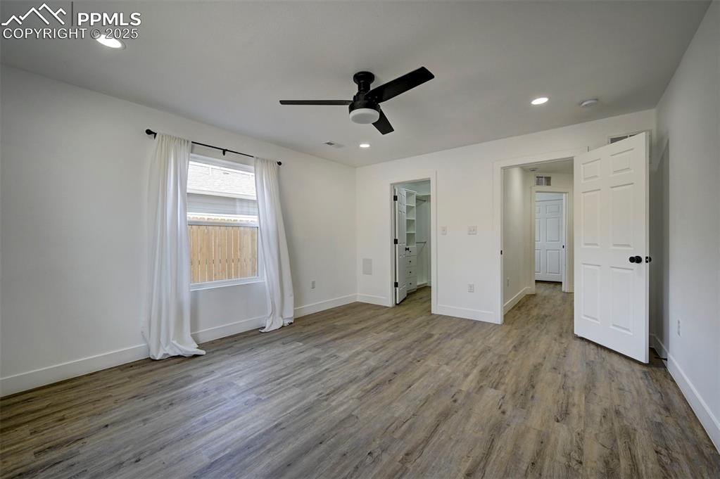 1436 Brewery Road Pueblo, CO 81001 - Photo 19 of 40 Unfurnished bedroom featuring baseboards, visible vents, wood finished floors, and recessed lighting