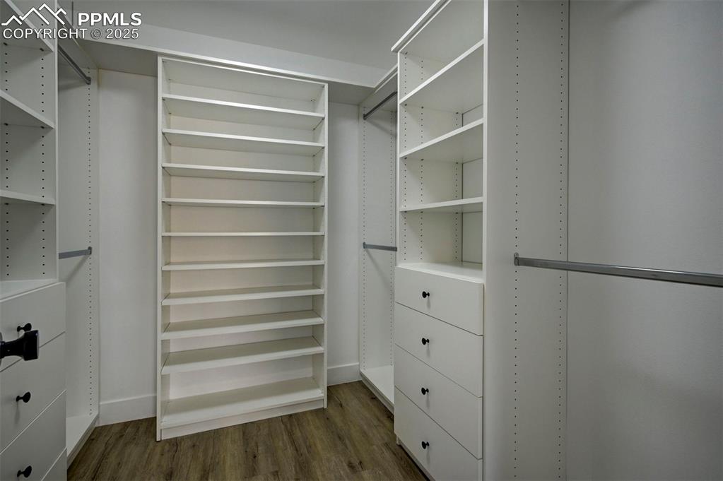 1436 Brewery Road Pueblo, CO 81001 - Photo 20 of 40 Spacious closet with dark wood-type flooring
