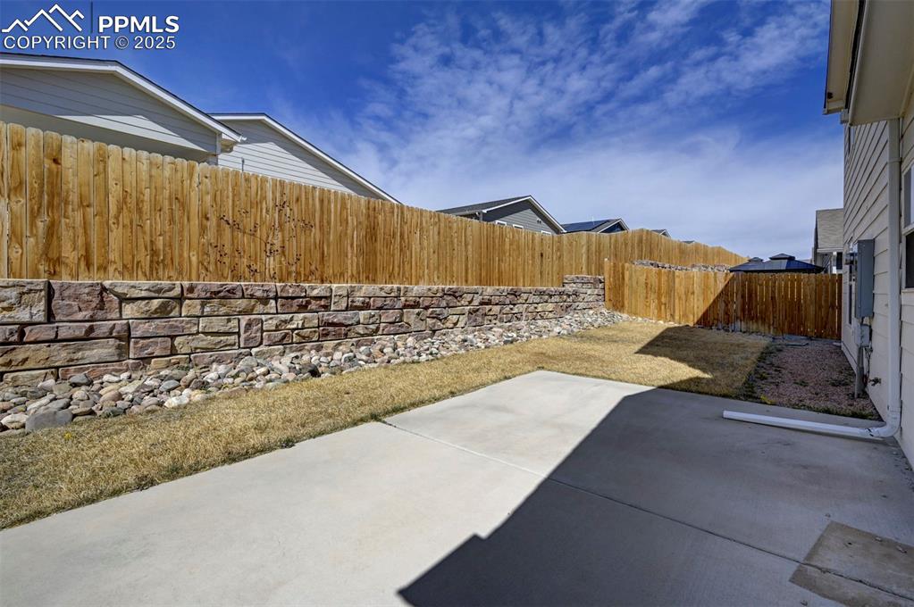 1436 Brewery Road Pueblo, CO 81001 - Photo 33 of 40 View of yard with a fenced backyard and a patio area