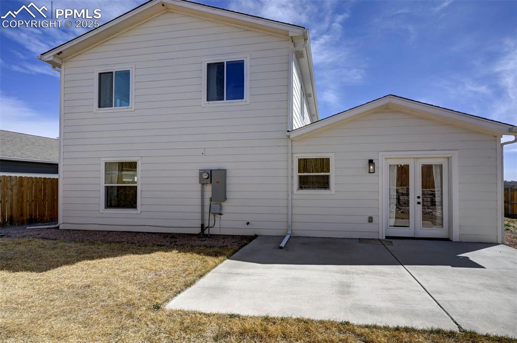 1436 Brewery Road Pueblo, CO 81001 - Photo 36 of 40 Rear view of house featuring fence, french doors, and a patio area
