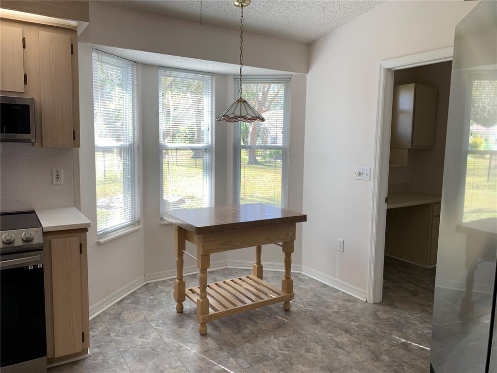 8340 Southwest 108th Pl Road Ocala, FL 34481 - Photo 7 of 32 Island can be moved to suit your needs