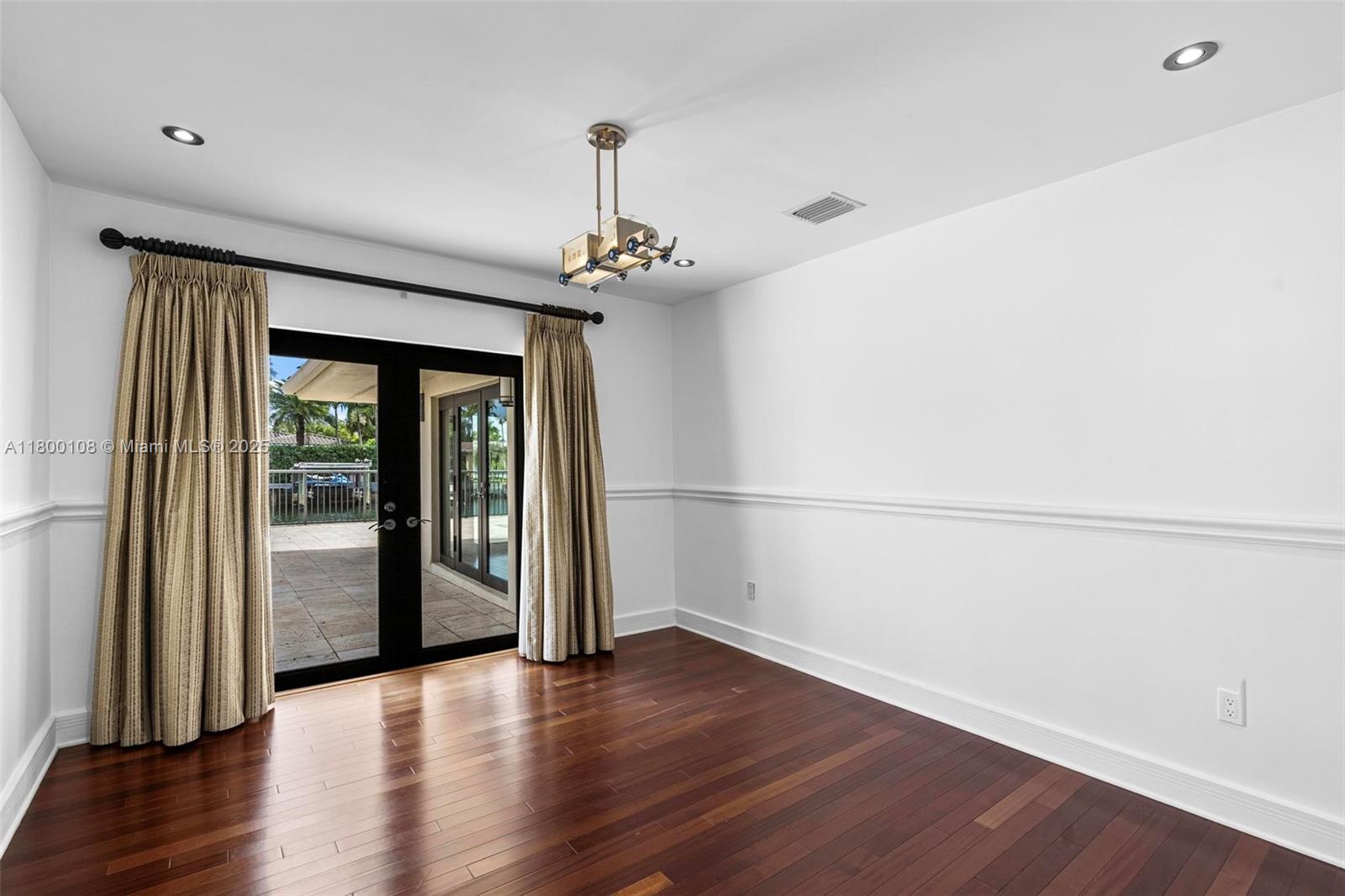 12605 Cyprus Road North Miami, FL 33181 - Photo 22 of 60 a view of a livingroom with wooden floor
