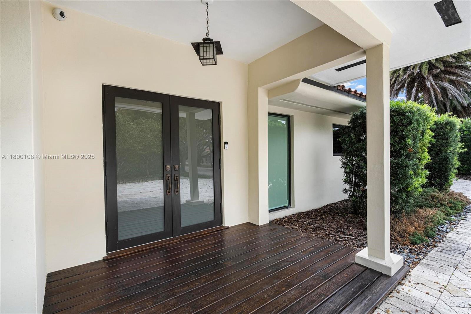 12605 Cyprus Road North Miami, FL 33181 - Photo 5 of 60 a view of entryway with wooden floor