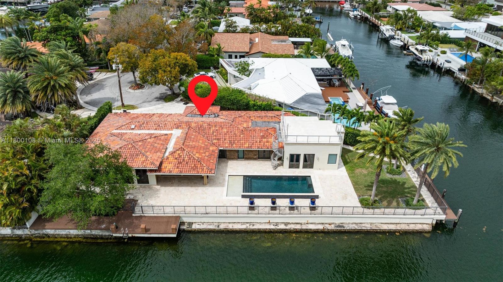 12605 Cyprus Road North Miami, FL 33181 - Photo 59 of 60 an aerial view of house with yard swimming pool and outdoor seating