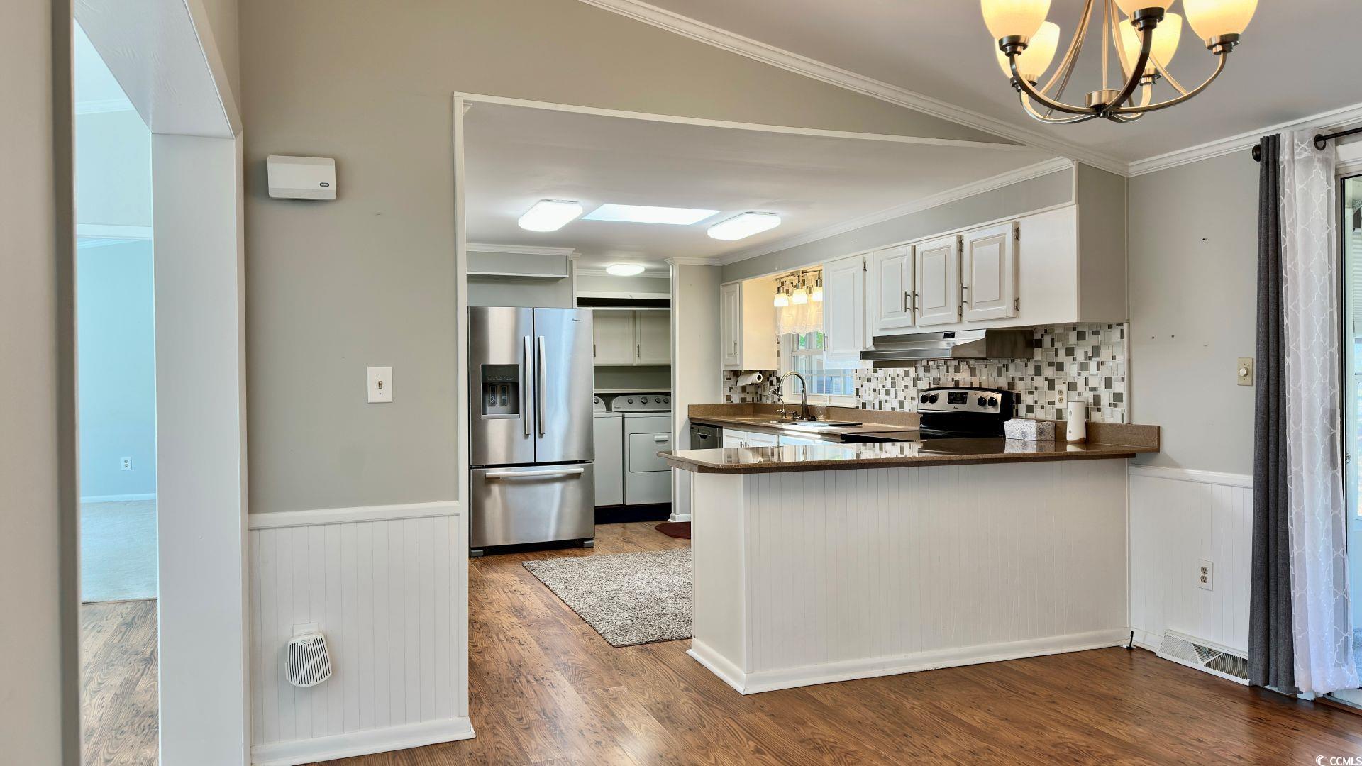 910 Grand Strand Trail Murrells Inlet, SC 29576 - Photo 10 of 33 Dining, living room and kitchen