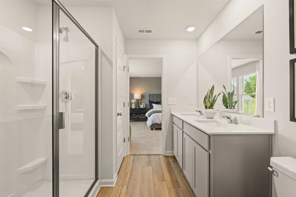 a bed room with a bed and a window