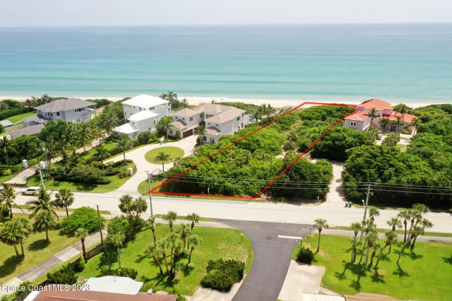 a view of a lake with a yard