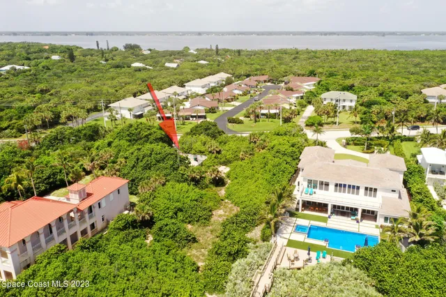 an aerial view of a house with a garden