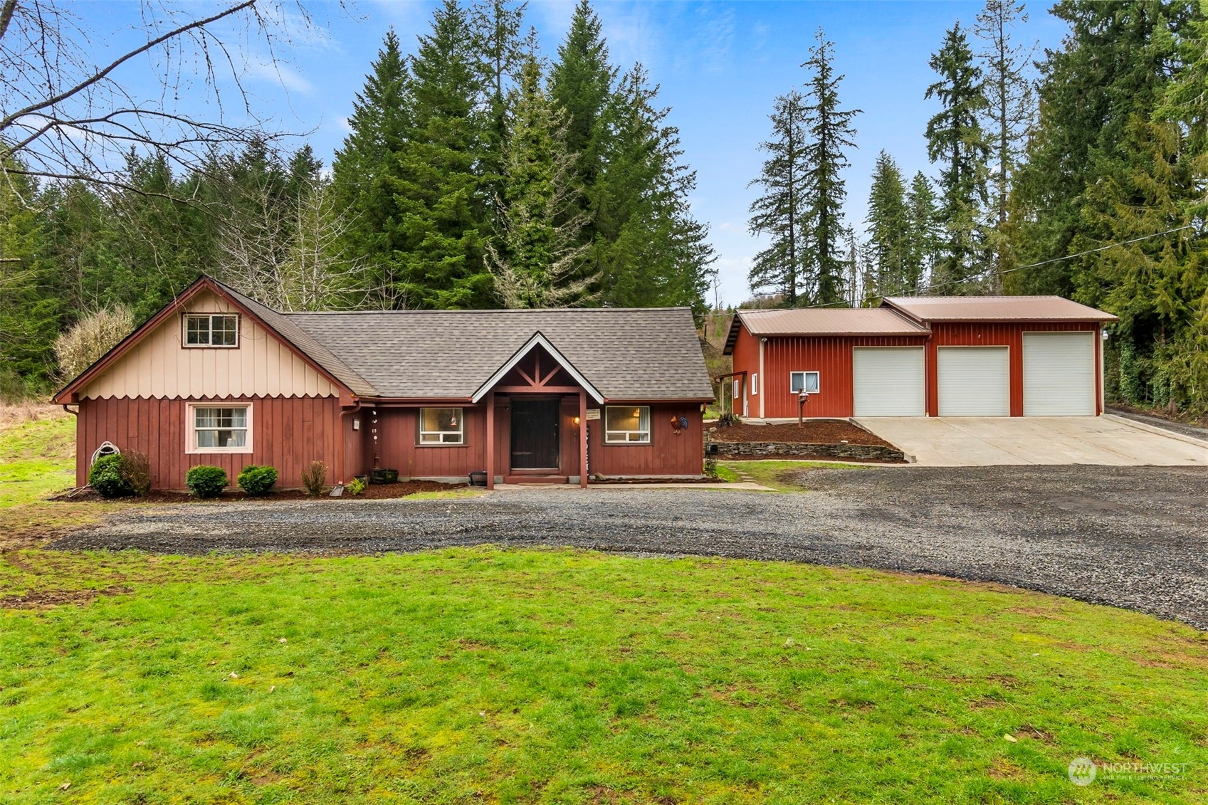 293 Logan Hill Road Chehalis, WA 98532 - Photo 1 of 36 a front view of a house with a yard and garage