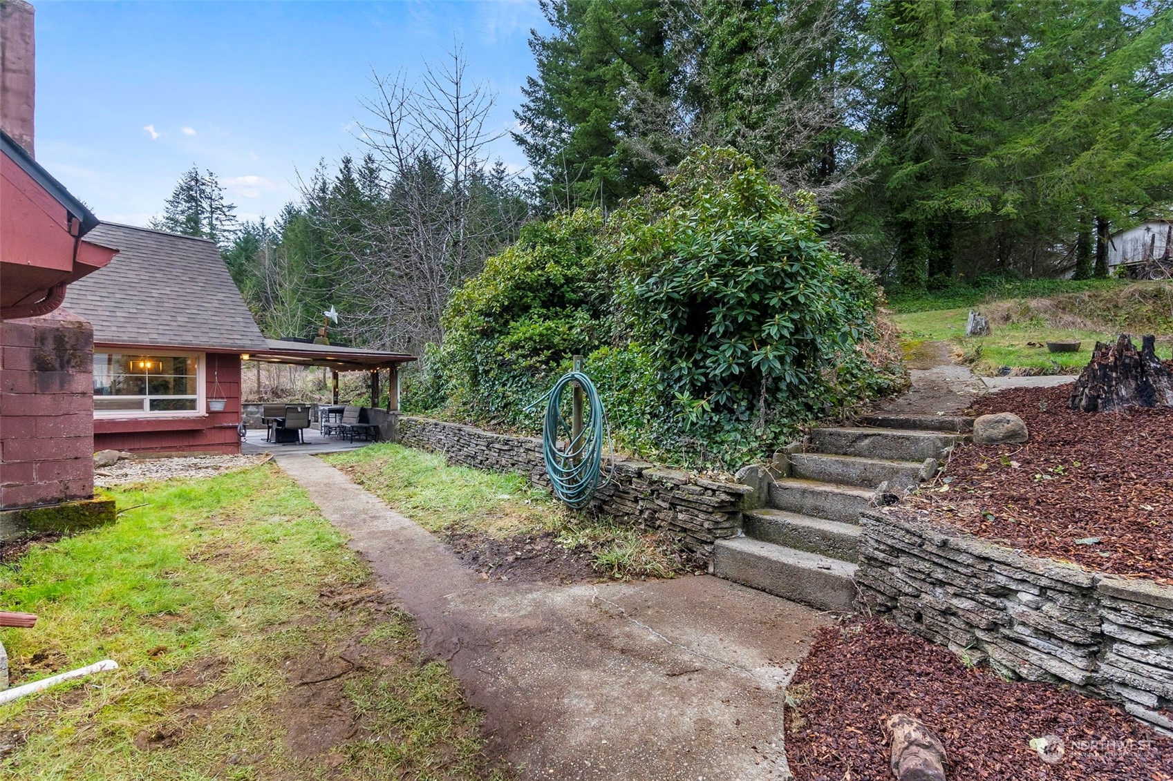 293 Logan Hill Road Chehalis, WA 98532 - Photo 26 of 36 a front view of a house with a yard and trees