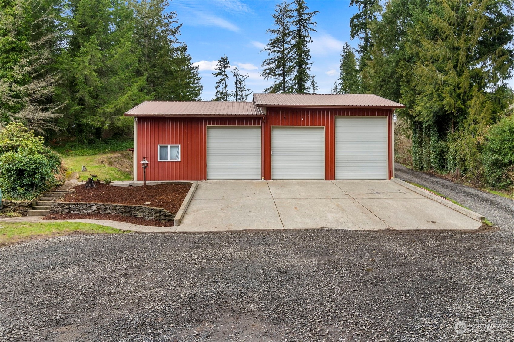 293 Logan Hill Road Chehalis, WA 98532 - Photo 28 of 36 a front view of a house with a yard and garage