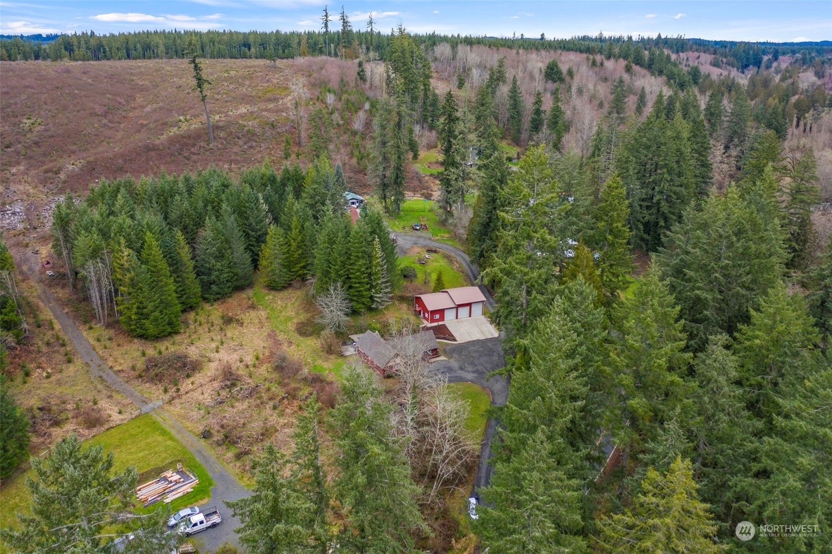 293 Logan Hill Road Chehalis, WA 98532 - Photo 33 of 36 a view of a yard with a tree