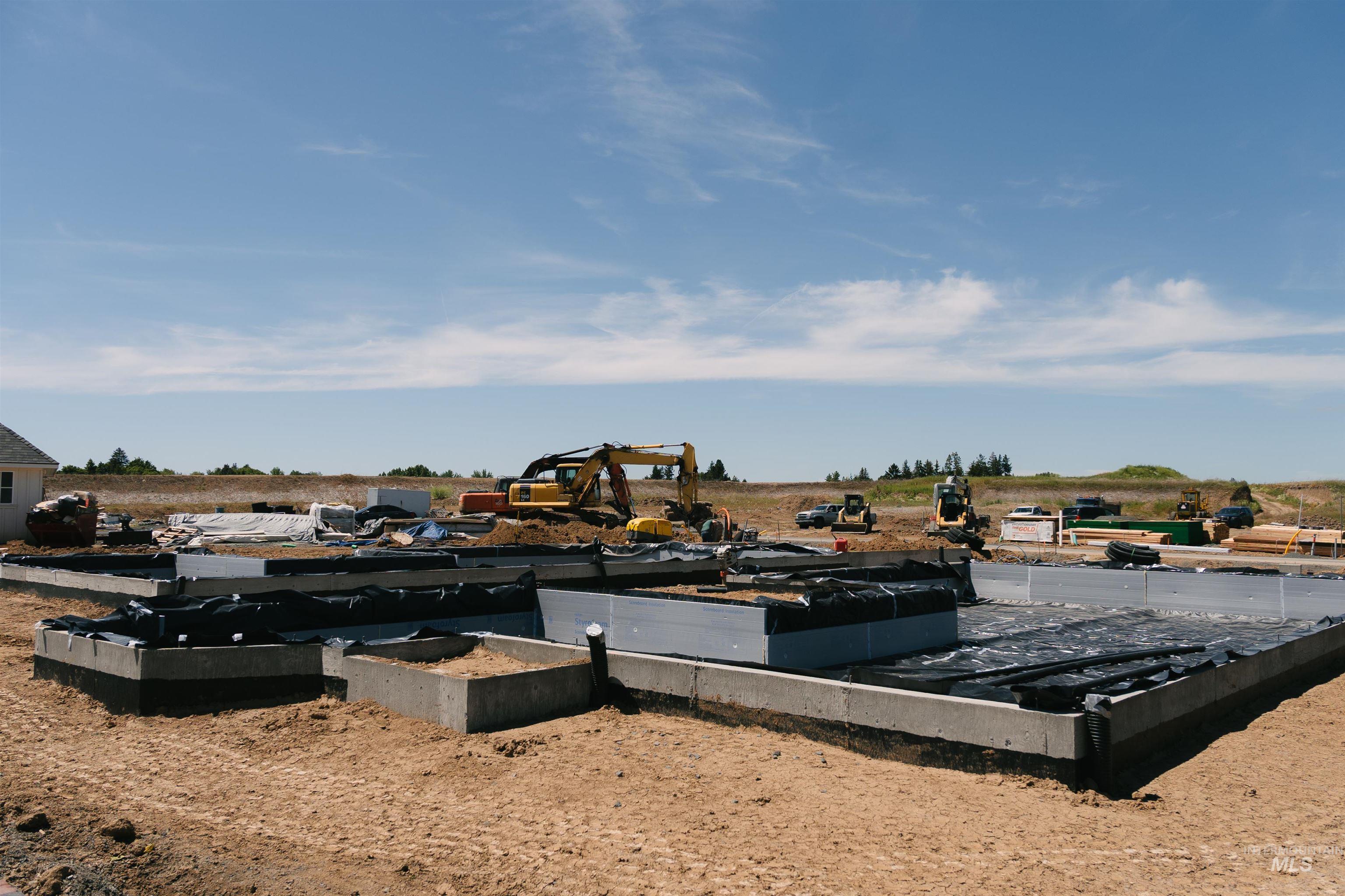 1463 Cottage Lane Moscow, ID 83843 - Photo 7 of 23 New construction foundation featuring concrete footings and perimeter walls, prepped for further development