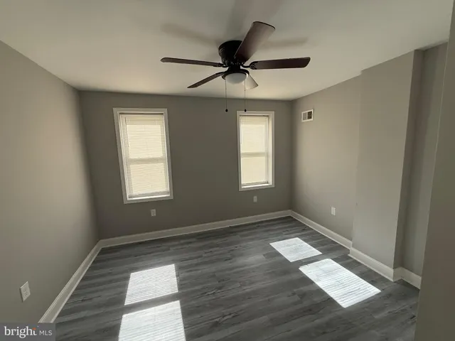 a view of an empty room and window