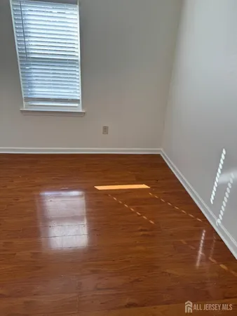 a view of lot of kitchen and a window