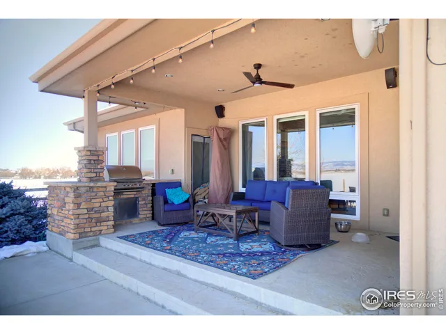a view of living room filled with furniture