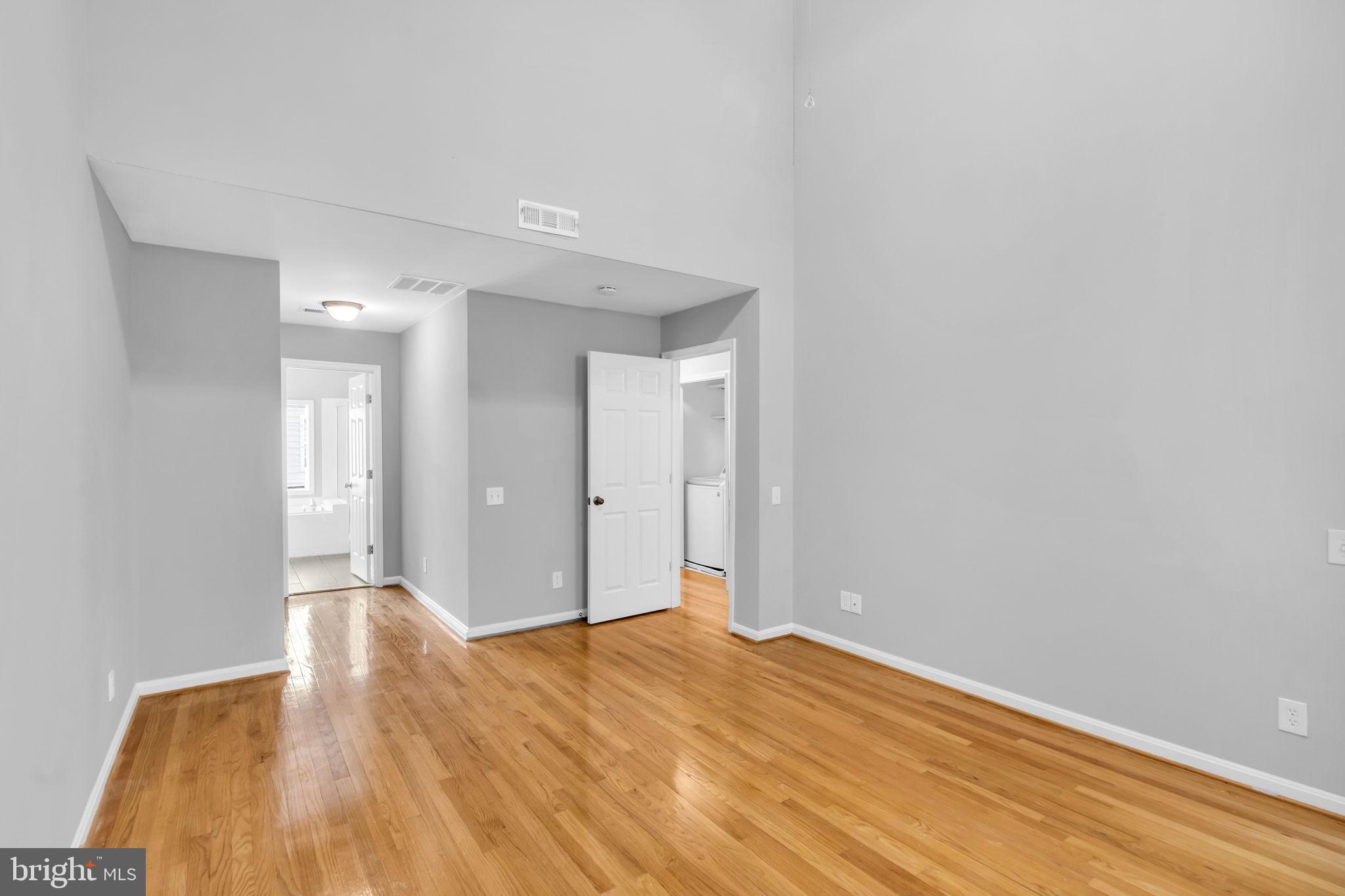 6013 Riddle Walk Alexandria, VA 22312 - Photo 16 of 31 a view of an empty room and wooden floor