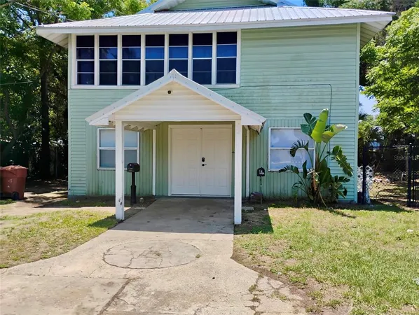 a house view with a outdoor space