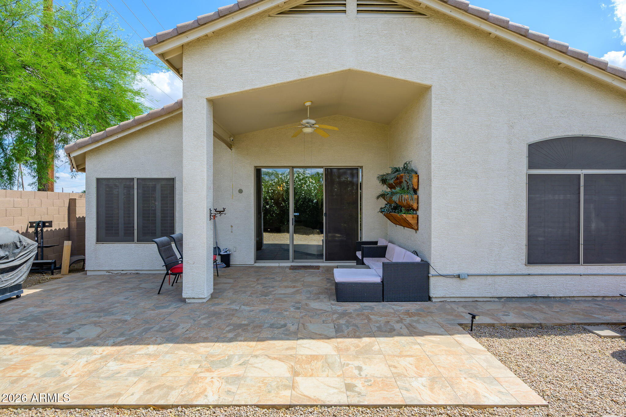 3136 East Roveen Avenue Phoenix, AZ 85032 - Photo 28 of 38 a front view of a house with patio