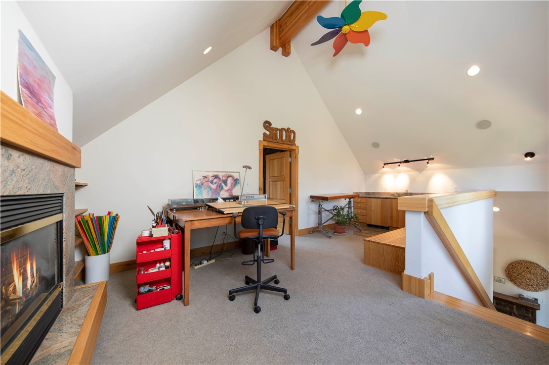 Tbd Tbd Johnson Road Silverthorne, CO 80498 - Photo 16 of 35 Home office loft with gas fireplace, wet bar/counter