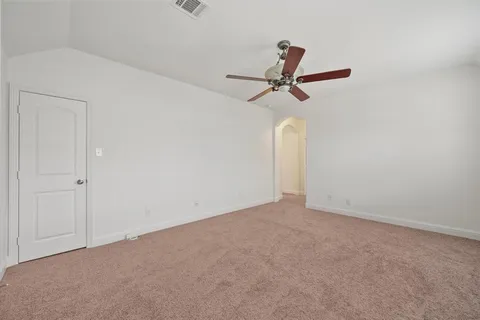 a view of a big room with carpet