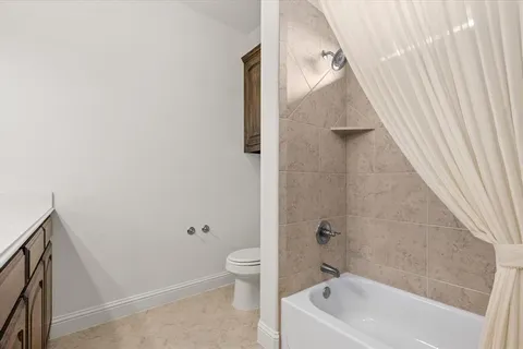 a bathroom with a white tub