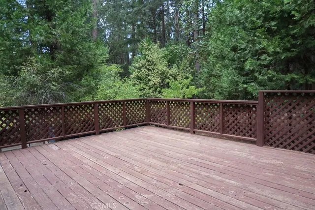 a backyard of a house with wooden floor