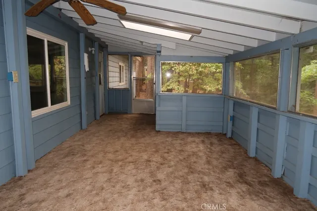 an empty room with windows