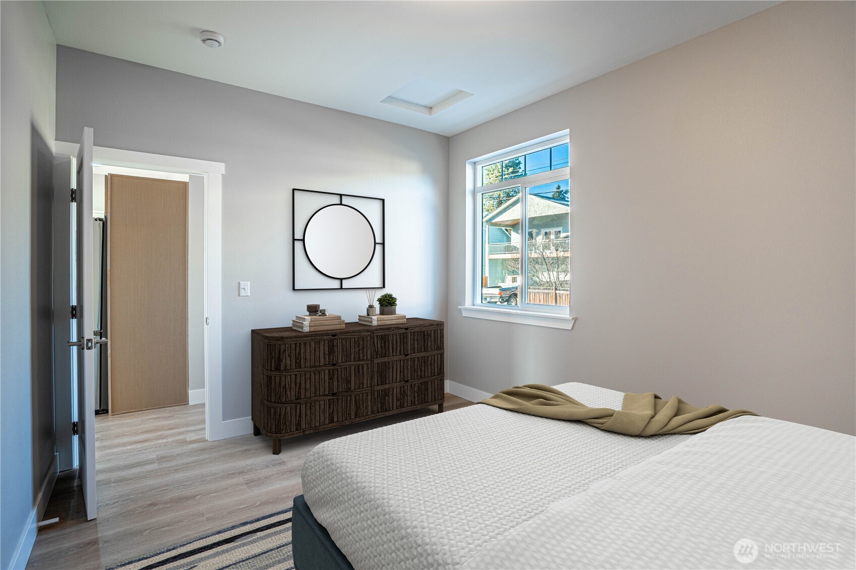 744 Wapato Way, Unit B Manson, WA 98831 - Photo 12 of 32 a bedroom with a bed and a dresser