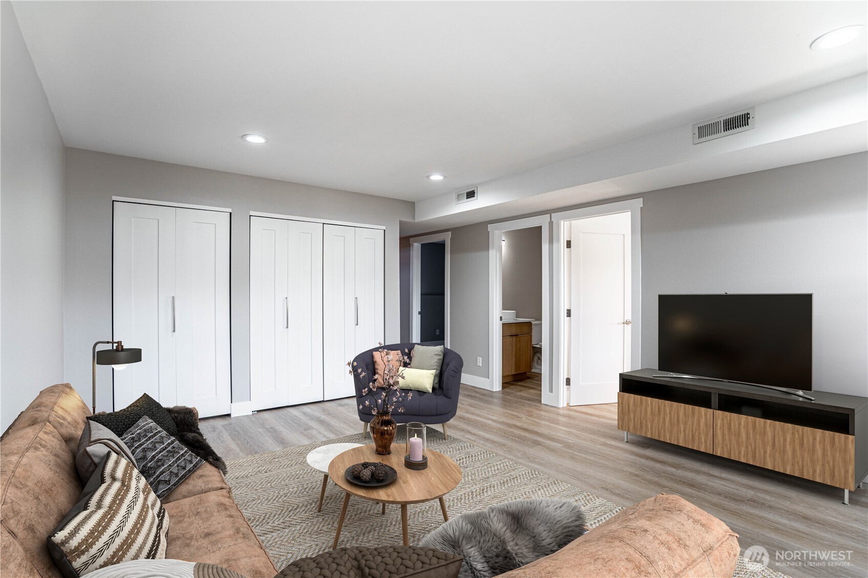744 Wapato Way, Unit B Manson, WA 98831 - Photo 18 of 32 a living room with furniture and a flat screen tv
