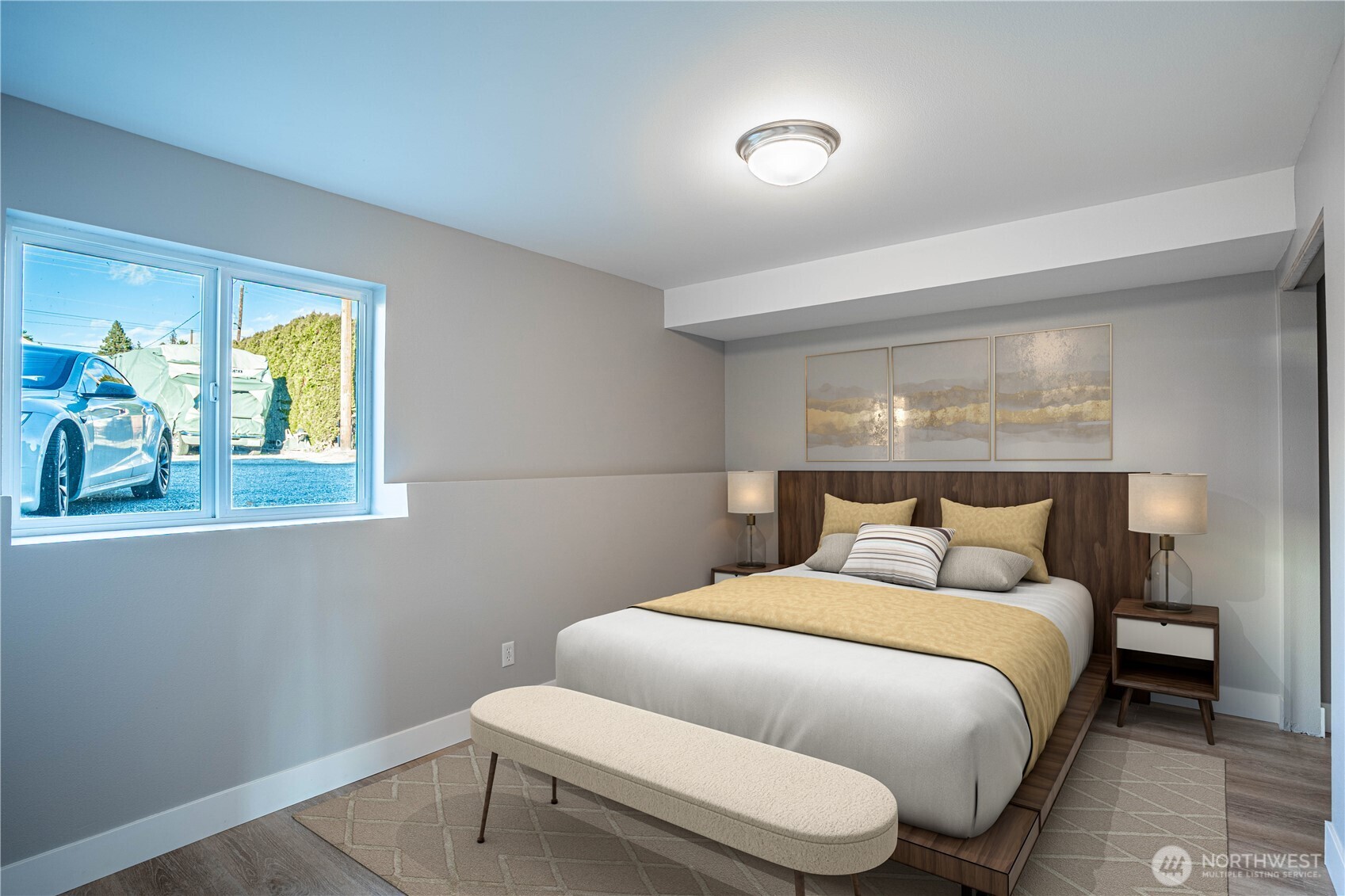 744 Wapato Way, Unit B Manson, WA 98831 - Photo 24 of 32 a bedroom with a bed and window