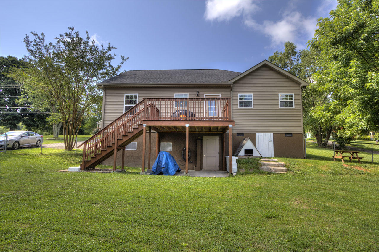 1971 Cecil Johnson Road Knoxville, TN 37921 - Photo 22 of 32 Backside, showing crawl space doors