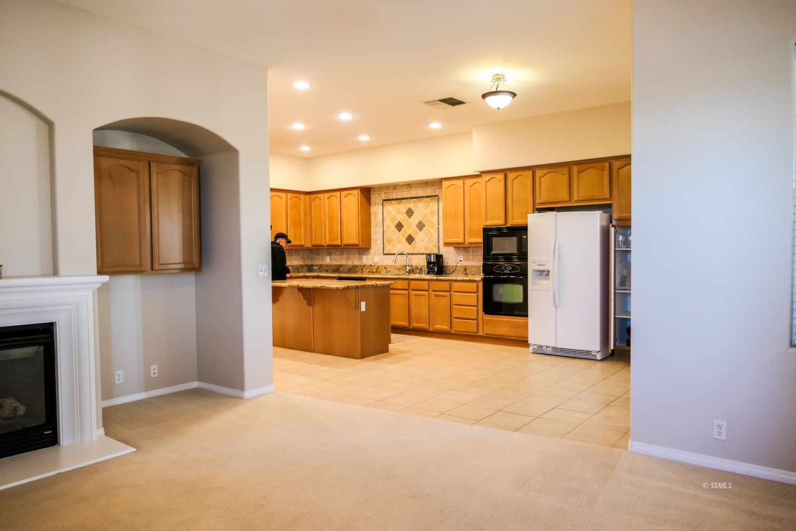 120 West Franklin Avenue Ridgecrest, CA 93555 - Photo 9 of 49 a view of a kitchen with a sink and refrigerator