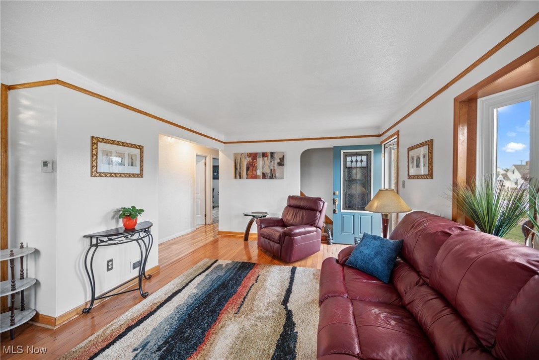 6305 Ackley Road Parma, OH 44129 - Photo 4 of 28 Living room room hardwood floors