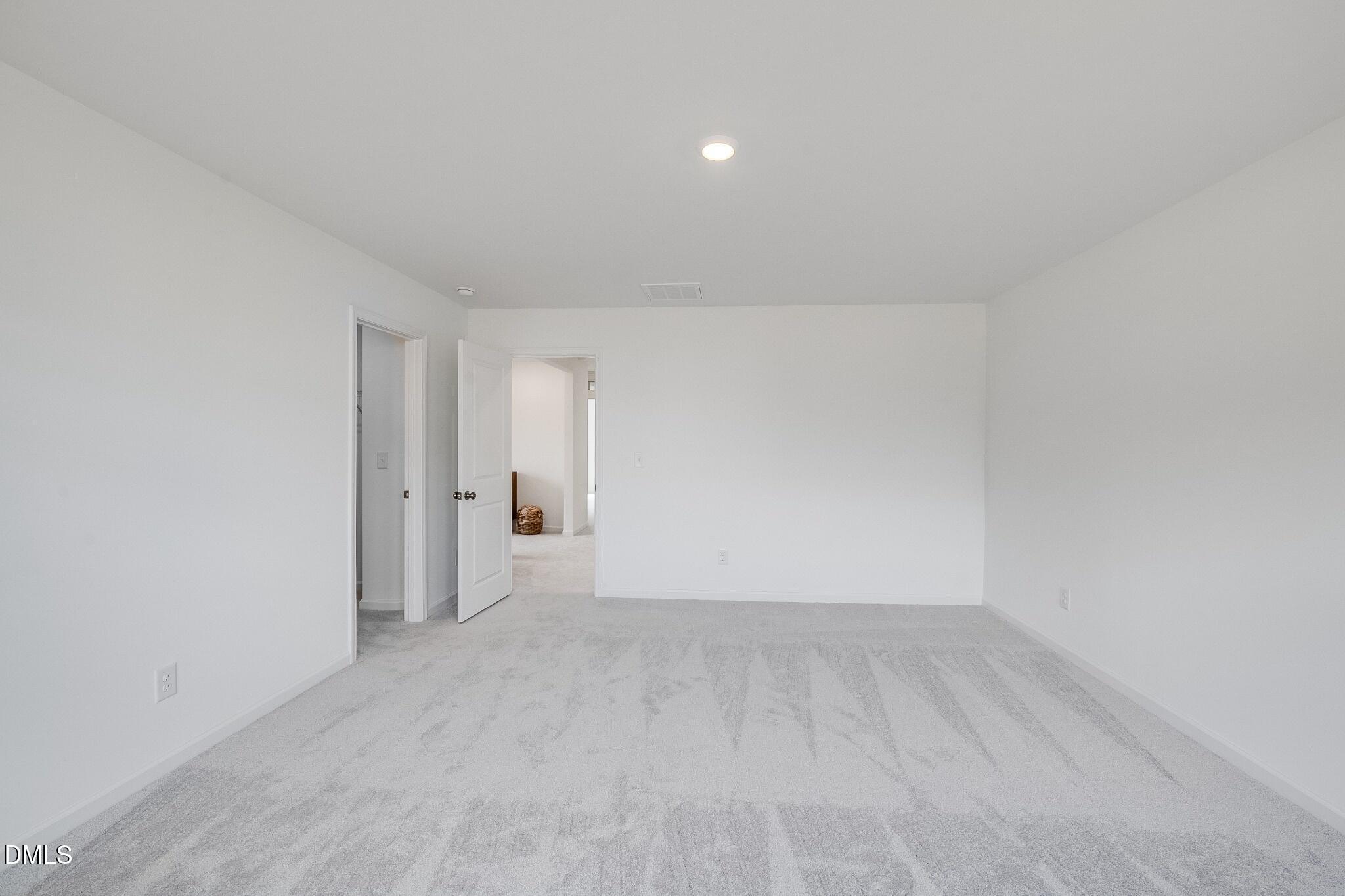 1004 Red Finch Way Angier, NC 27501 - Photo 16 of 42 a view of an empty room