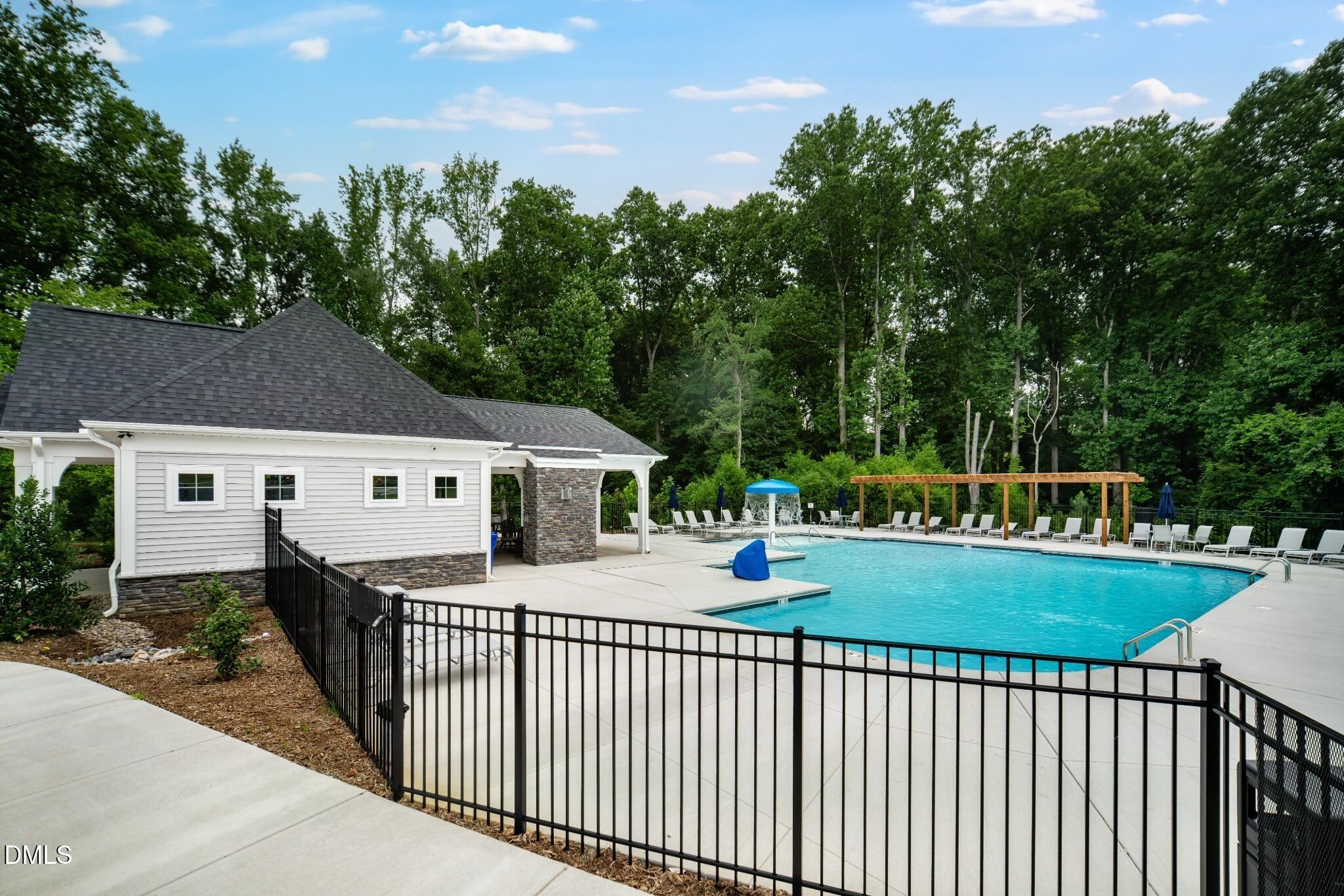 1004 Red Finch Way Angier, NC 27501 - Photo 37 of 42 a view of a house with a small yard and deck