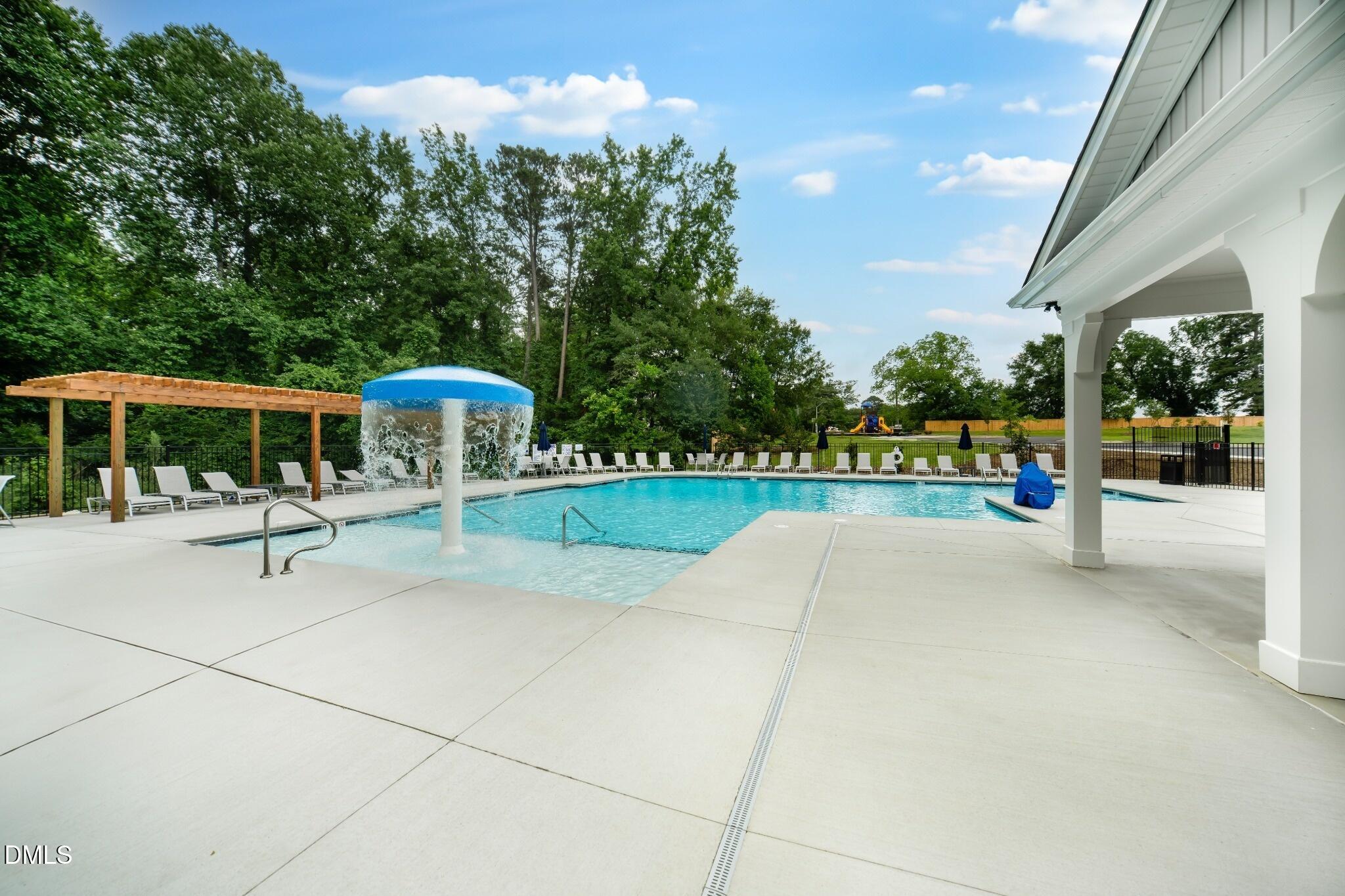 1004 Red Finch Way Angier, NC 27501 - Photo 38 of 42 a view of house with swimming pool outdoor seating