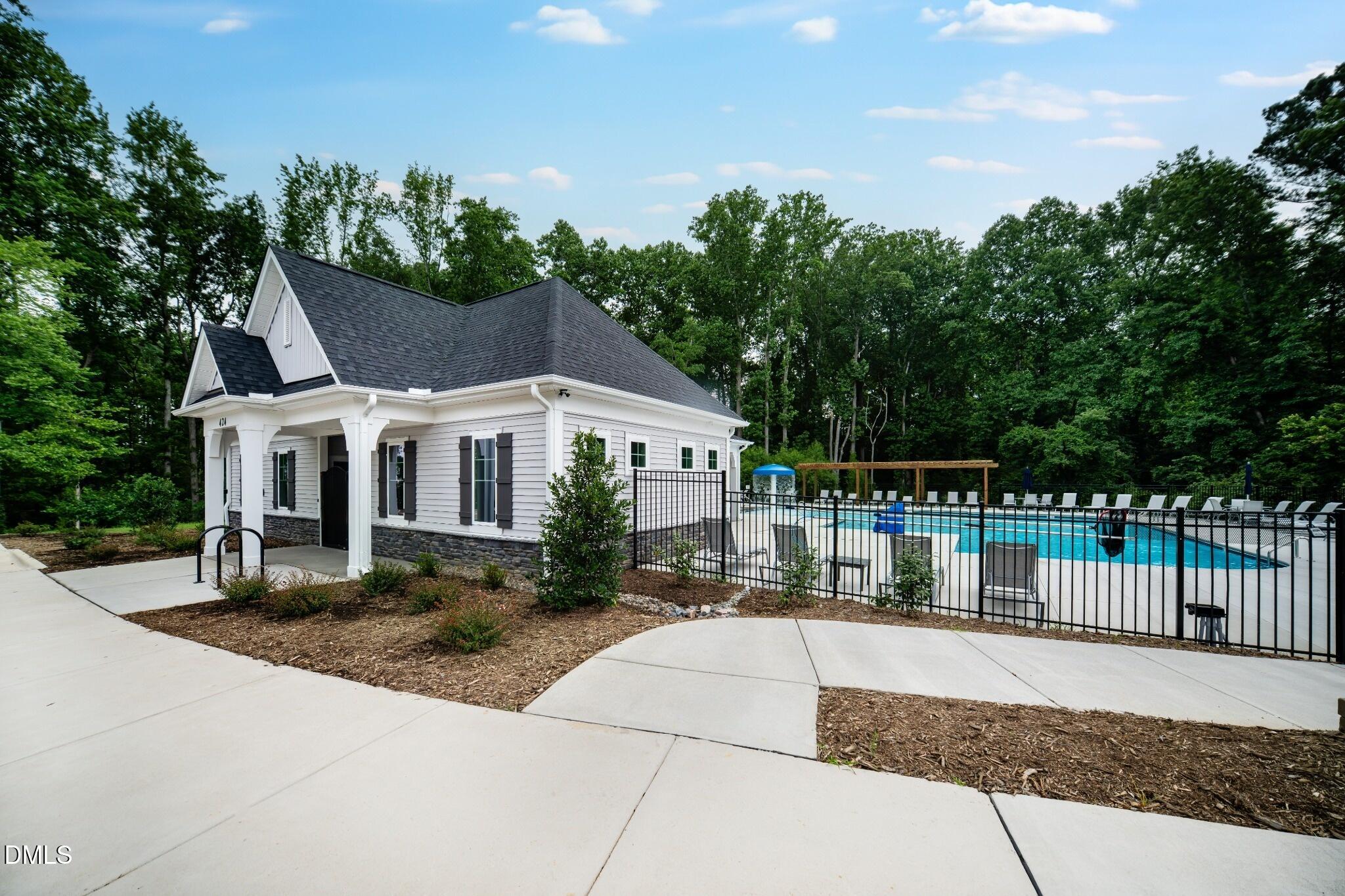 1004 Red Finch Way Angier, NC 27501 - Photo 42 of 42 a view of house with outdoor space and sitting area