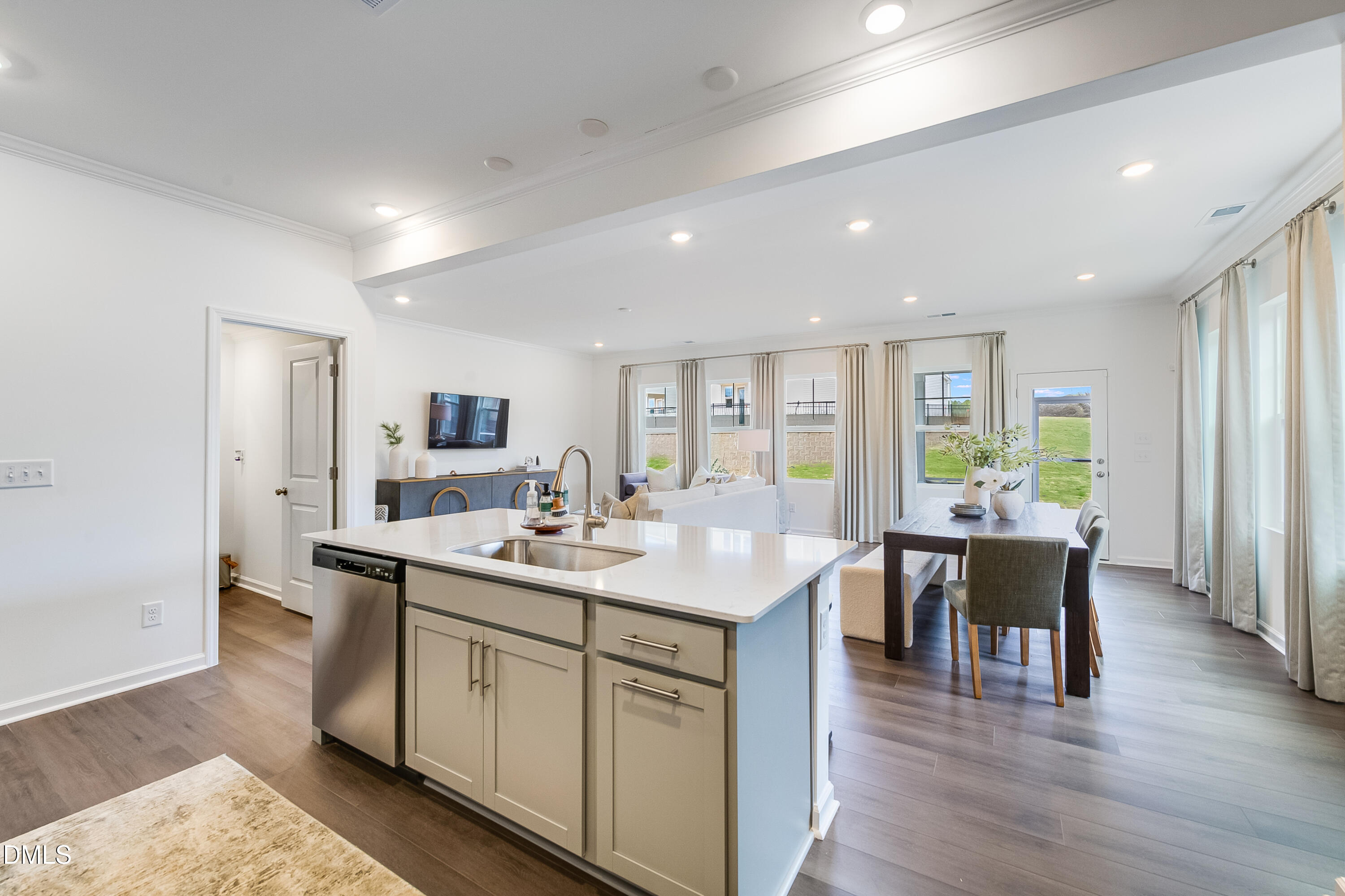 1004 Red Finch Way Angier, NC 27501 - Photo 7 of 42 a view of a dining room with furniture window and wooden floor