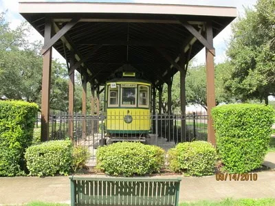 a childrens park with lots of swings and slides